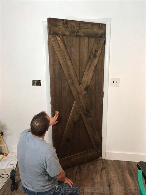 DIY Wood Barn Door on Hinges for $25 #remodelaholic | Interior barn ...