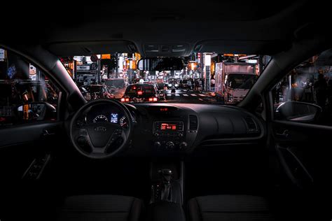 Black Car Steering Wheel and Interior during Night Time · Free Stock Photo