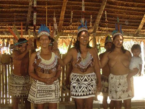 some people are standing together in native clothing