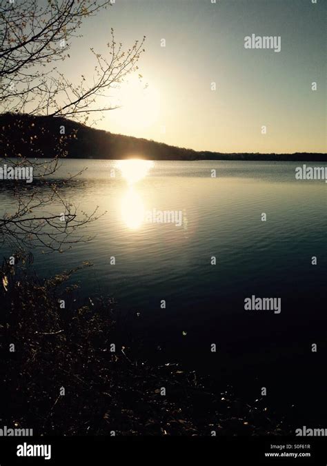 Early morning sunrise at lake Stock Photo - Alamy