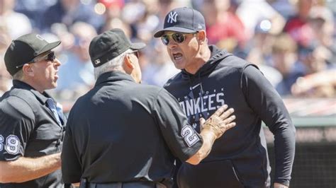 SEE IT: Yankees' Aaron Boone ejected after umpires overturn inning ...