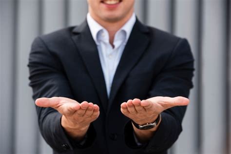 Free Photo | Businessman holding his hands out