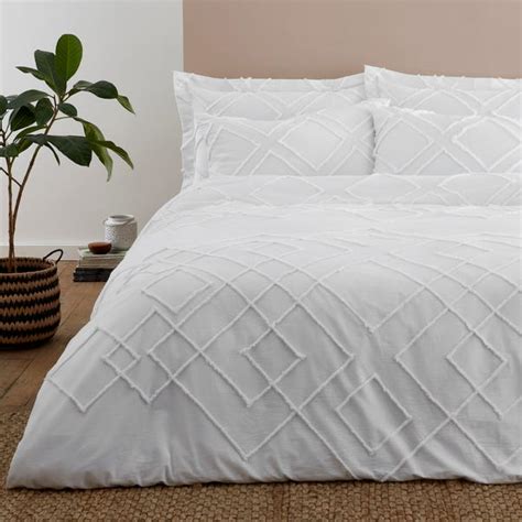 Souk White Tufted 100% Cotton Duvet Cover and Pillowcase Set | Dunelm