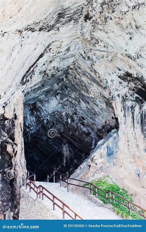 Dripstone cave entrance stock photo. Image of stairs - 29139350