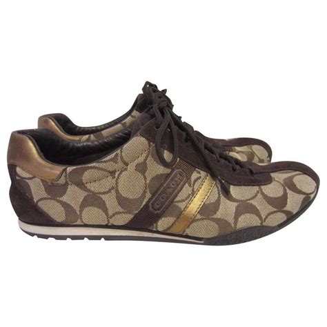 Coach Katelyn sneaker with gold trim Brown Golden Caramel Suede Cloth ...