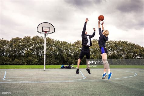 Basketball 1v1 Manwoman In A London Playground High-Res Stock Photo ...