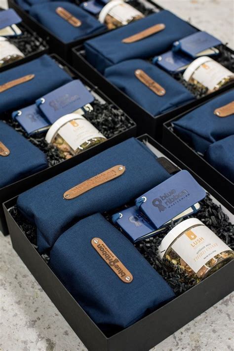 CORPORATE EVENT GIFTS// Blue and black company logo corporate retreat ...