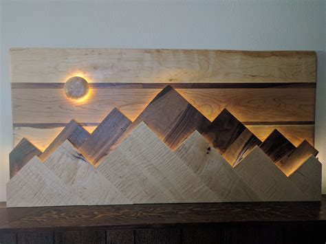 Wood mountain range wall art. The sun/moon functions as a dimmer switch ...