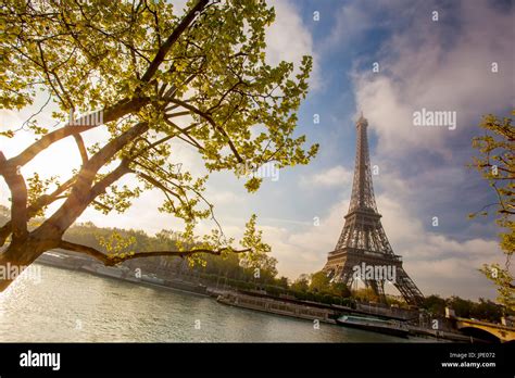 Eiffel Tower with boat on Seine in Paris, France Stock Photo - Alamy