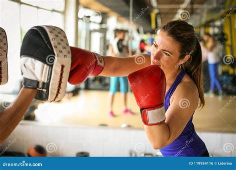 Woman Boxer Hitting the Glove of His Sparring Partner. Woman Wo Stock ...