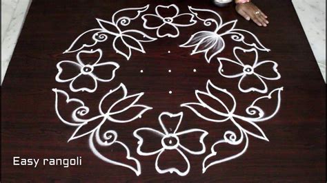 flower kolam designs with 9 dots *easy rangoli des | ZCaKgR8QxaU