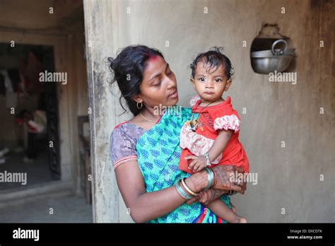 Mother and child. Kurmi caste. Bhilwara village, district Hazaribaug ...