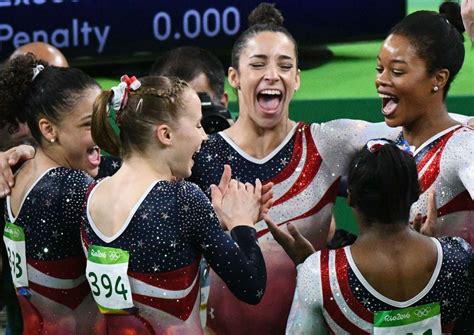 Gymnastics at the Rio Olympics - Team USA celebrates during the women's ...