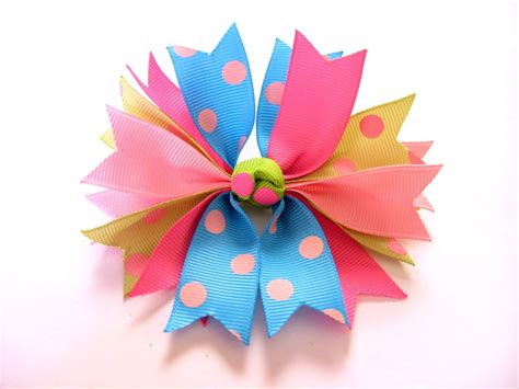 How to make ribbon spike hair bows tutorial / by DIYboutiqueShoppe