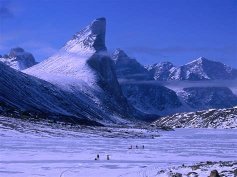 Meet Canada's Mount Thor: The World's Steepest, Tallest Cliff | Condé ...