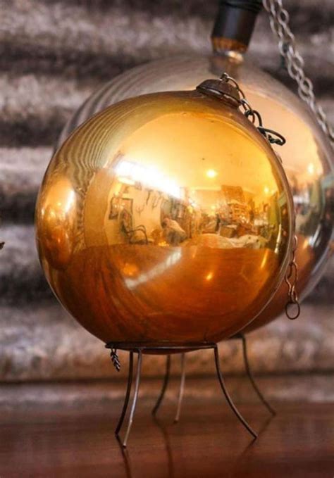 Gold witches ball in Antique Coloured Glass