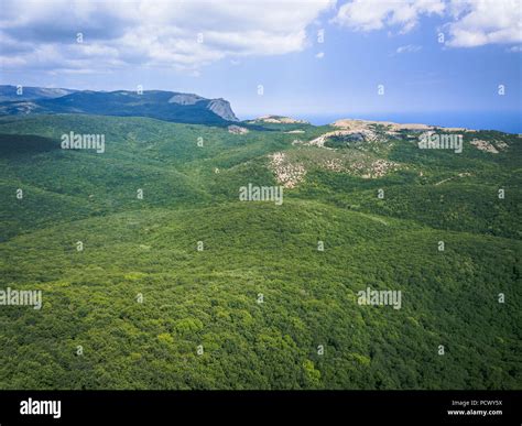 Aerial view mountains and sea from drone Stock Photo - Alamy