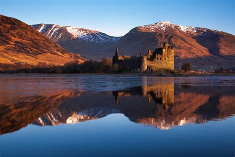 Kilchurn Castle, red sunrise, Loch Awe, Scotland.