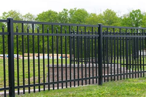 Premium Photo | Iron blackblack steel fence of residential house modern ...