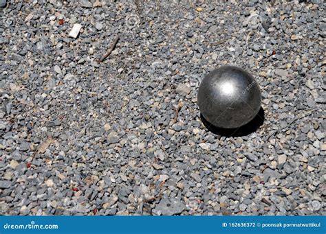 Metallic Petanque Ball on the Ground Stock Photo - Image of note, field ...