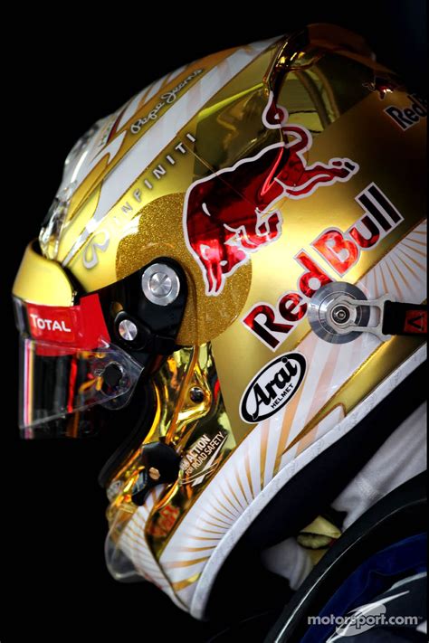 Sebastian Vettel's new gold helmet design