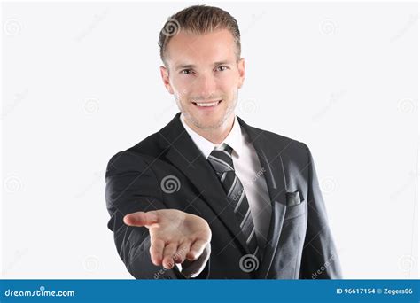 Handsome Young Man in Suit Holding His Hand Out Stock Photo - Image of ...