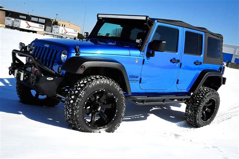 Blue Four Door Jeep Wrangler