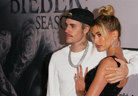 Hailey Baldwin was reluctant to kiss Justin Bieber in public