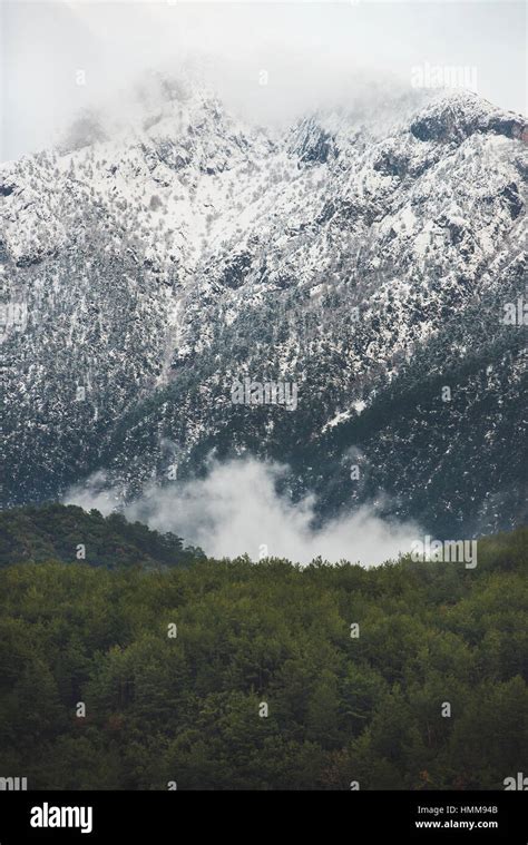 Green slopes of the Taurus mountains covered with snow Stock Photo - Alamy