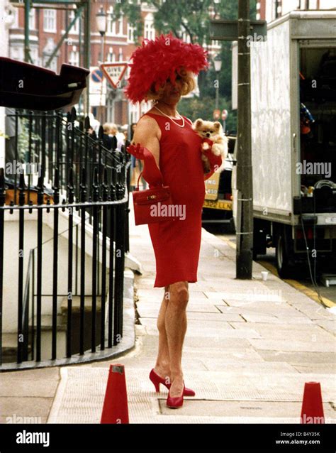 John Cleese comedian actor in drag dressed as woman Stock Photo - Alamy