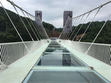 World’s highest glass bridge in China to include three crazy swings ...