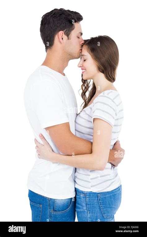 Cute couple embracing and kissing Stock Photo - Alamy