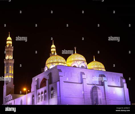 Al Ameen Mosque at night, Muscat Oman Stock Photo - Alamy