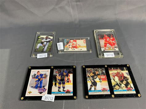 7 ASSORTED HOCKEY & BASEBALL CARDS - Able Auctions