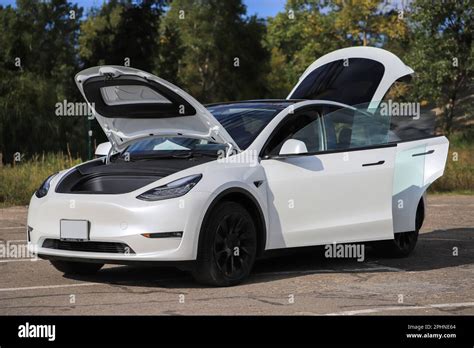 2024 Tesla Model Y Doors Open - Alana Augusta