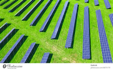 Solar panels in green field, aerial view - a Royalty Free Stock Photo ...