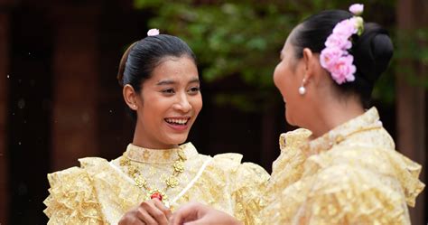 Handheld shot, Selective focus, Young beautiful women with Thai ...