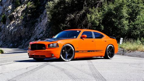 Bright Orange Dodge Charger with Contrasting Black Accents — CARiD.com ...