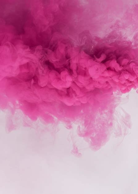 Free Photo | Pink smoke effect on a white background