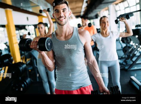 Group of people have workout in gym Stock Photo - Alamy