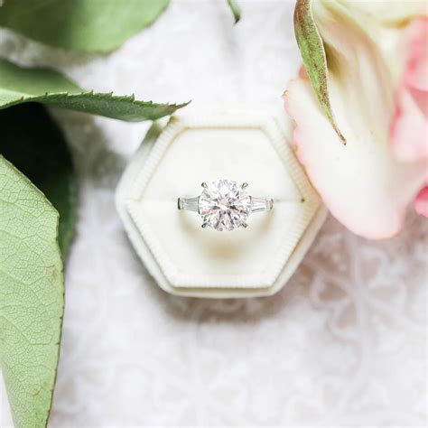 Round and Baguette Diamond Engagement Ring