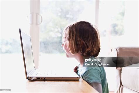 Young Child Enjoys Ichat Video Chat Conversation High-Res Stock Photo ...