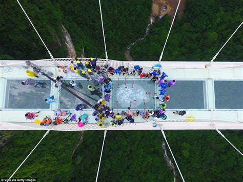 China's terrifying glass bridge is set to re-open after being forced to ...