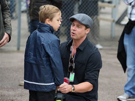 Brad Pitt and son Knox at the MotoGP British Grand Prix in England ...