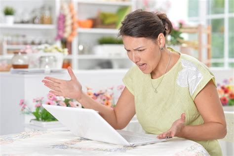 Premium Photo | Portrait of angry young woman using laptop