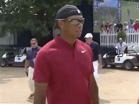 The best (and most alpha) Tiger Woods "walk-in" looks through the years ...