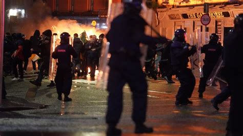 Riots in Dublin after stabbing near school - as police car and buses ...