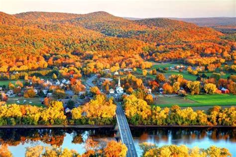 A picturesque village sits alongside the Connecticut River in the ...