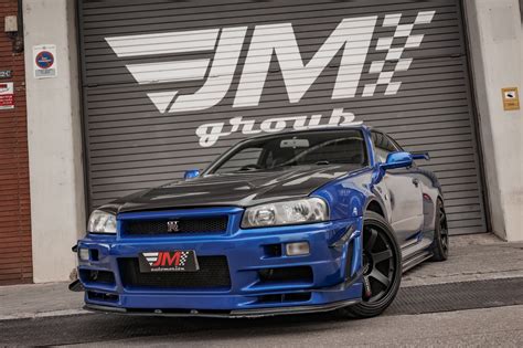 NISSAN SKYLINE GT-R R34 NISMO -CARBONO EXTERIOR VISIBLE-