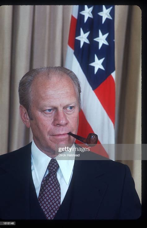 Gerald Ford smokes on a pipe August 19, 1976 in Kansas City,... News ...